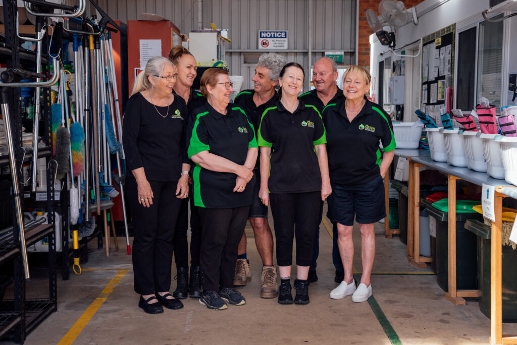 The Green Clean Team staff in members standing in a depot in Bendigo, Central Victoria.